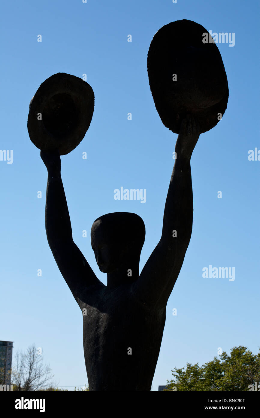 Detail from Netherlands-Canada Liberation Monument: The Man with two hats. Stock Photo