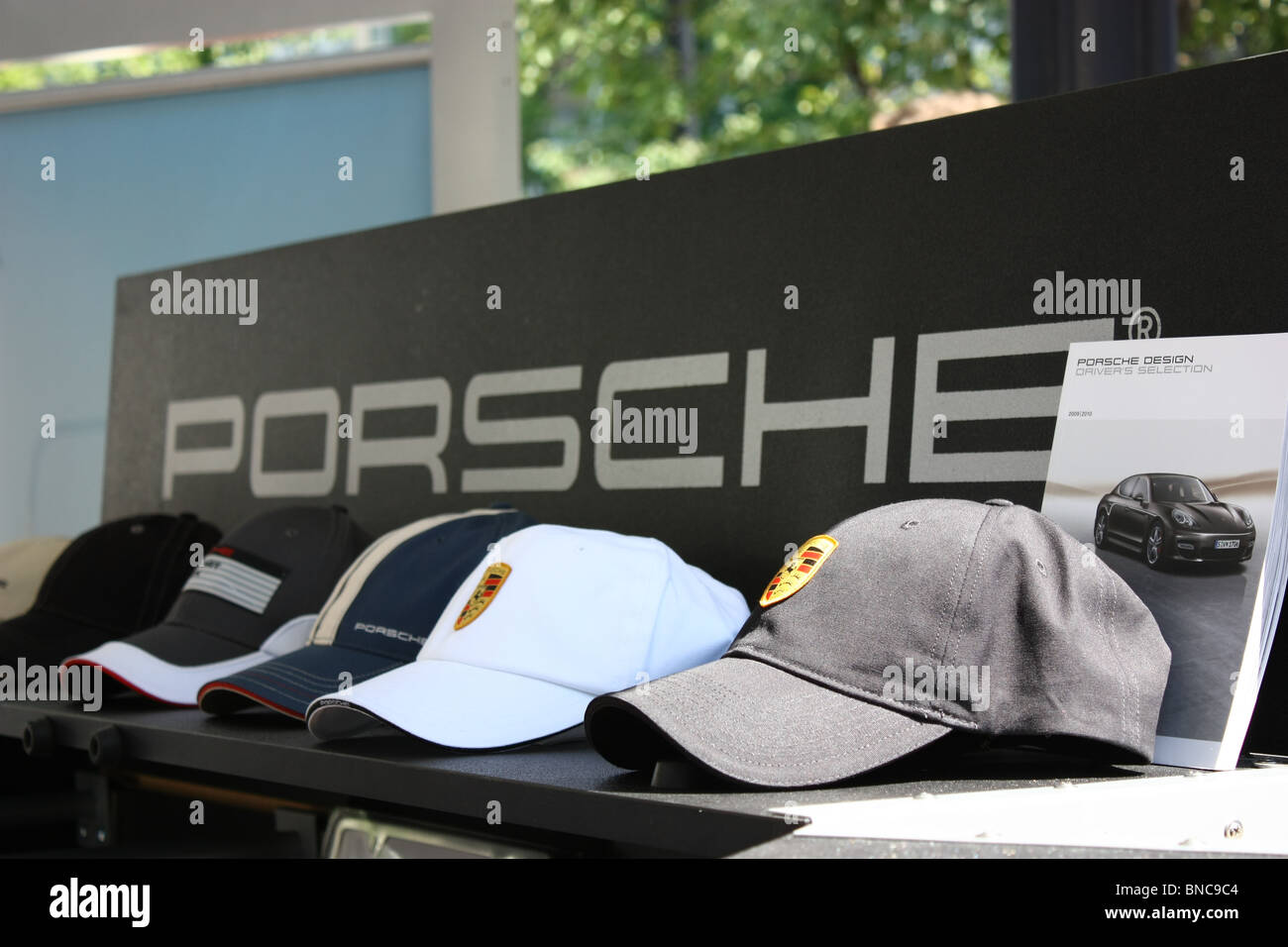 Porsche baseball cap merchandise sale Stock Photo - Alamy