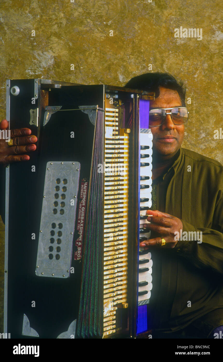 Indian harmonium player hires stock photography and images Alamy