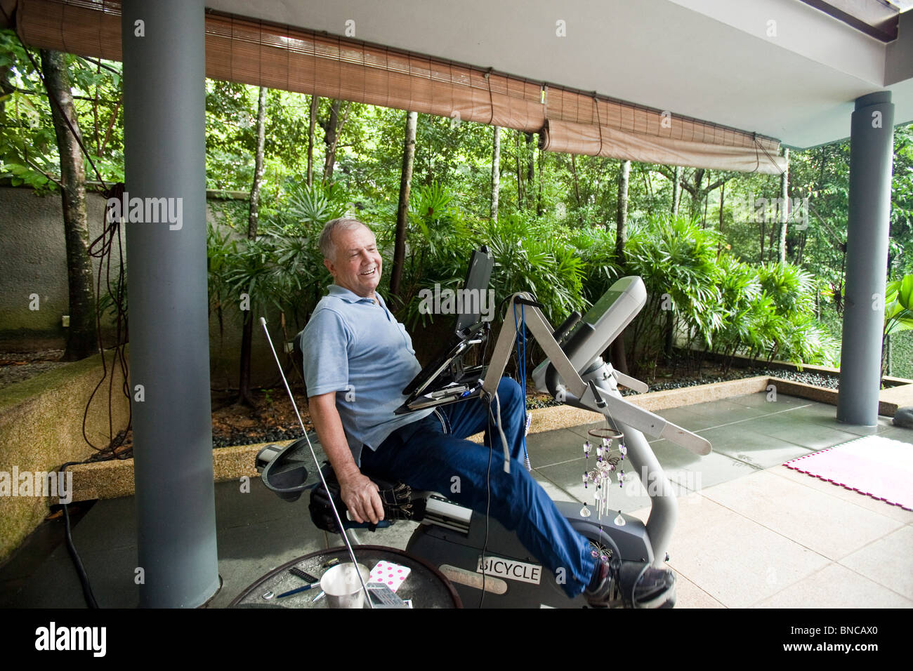 American investor and financial commentator Jim Rogers speaks during an  interview at his home, in Singapore. June 29, 2010 Stock Photo - Alamy