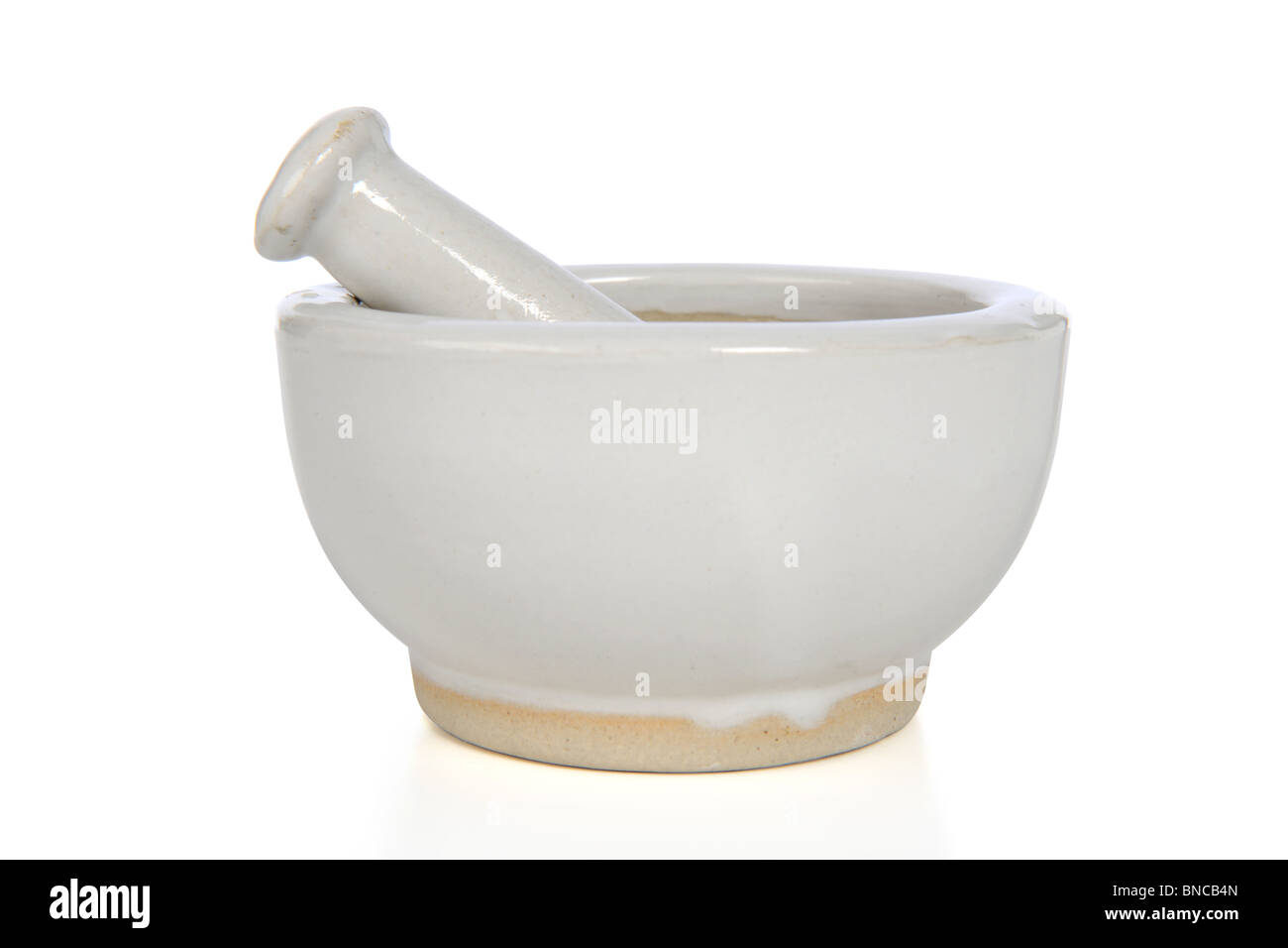 Mortar and pestle isolated over white background - With clipping path Stock Photo