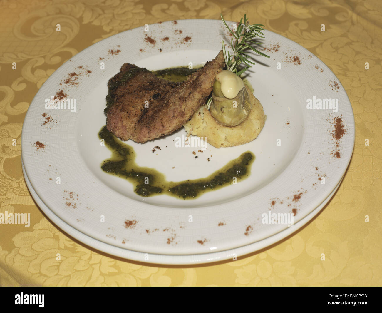 plate of veal and artichoke heart palermo sicily italy B0055P 0007 Stock Photo