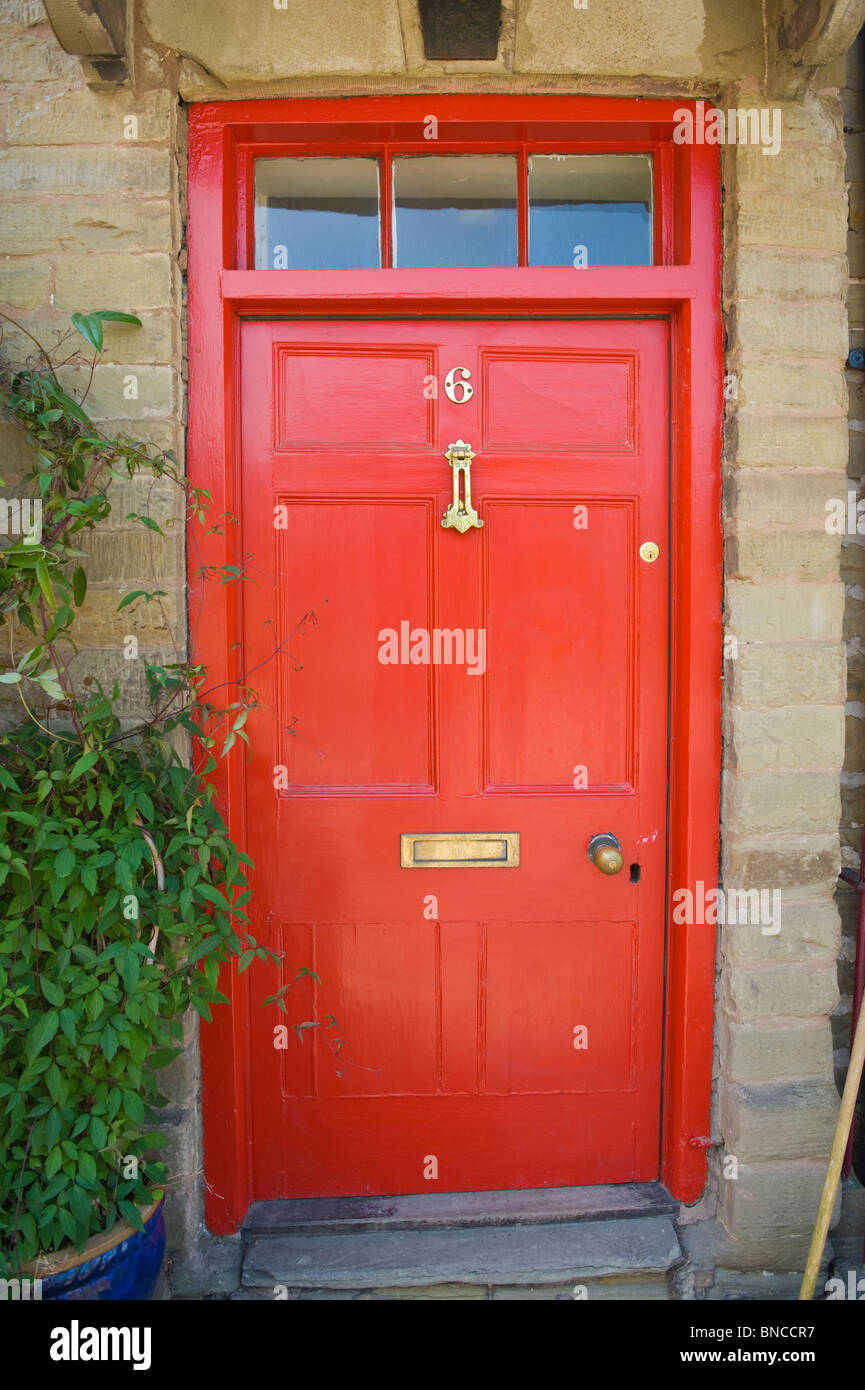 No 6 red front door of house in Hay-on-Wye Powys Wales UK Stock Photo