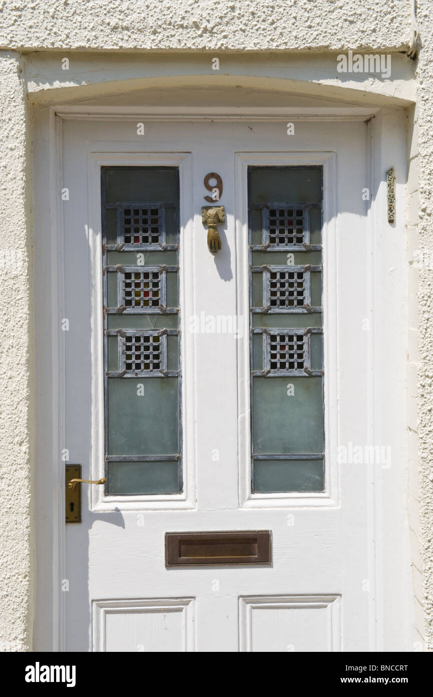 No 9 white front door of house in Hay-on-Wye Powys Wales UK Stock Photo