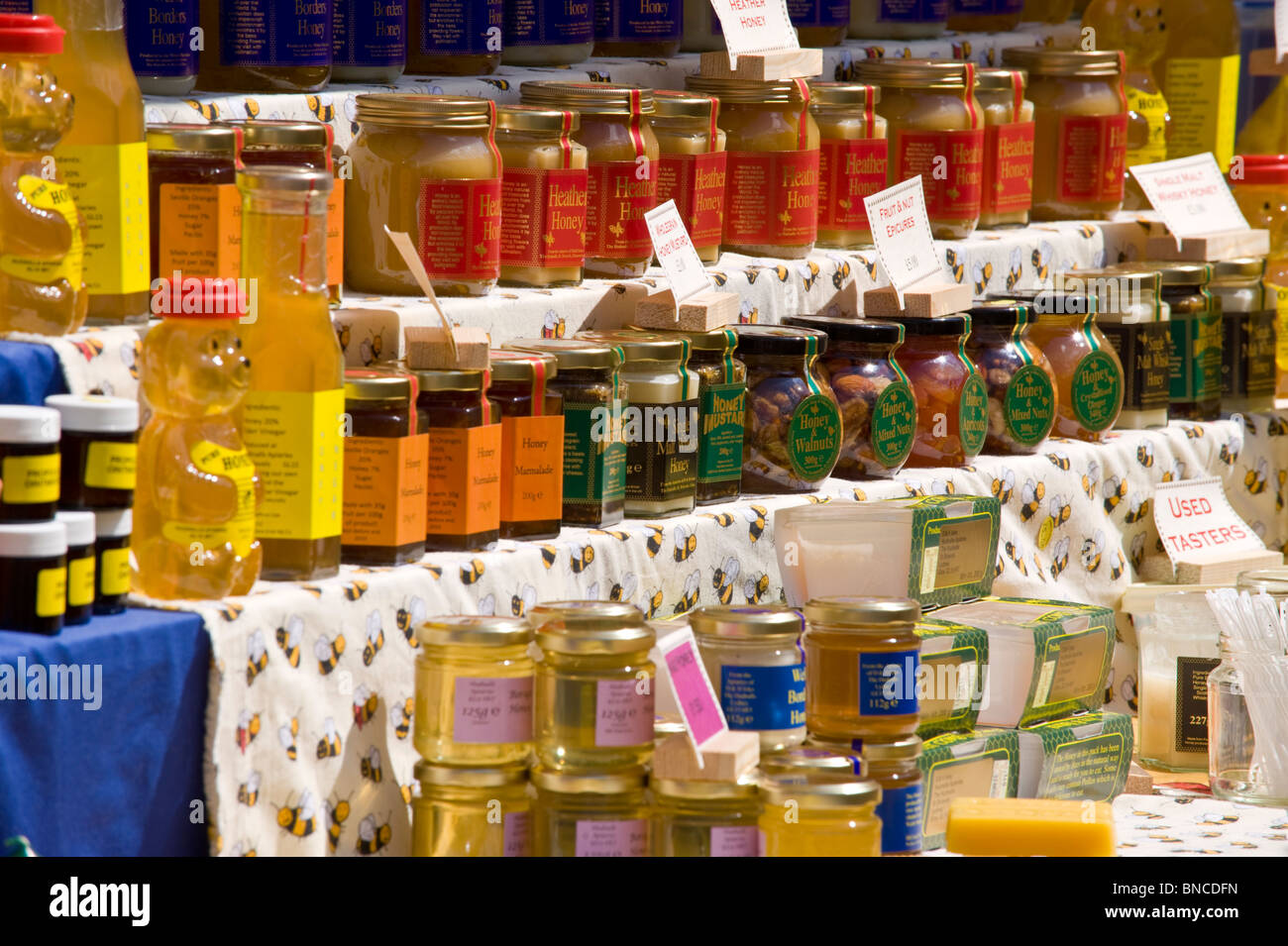 Jars of honey for sale on stall at Hay Food Festival in HayonWye