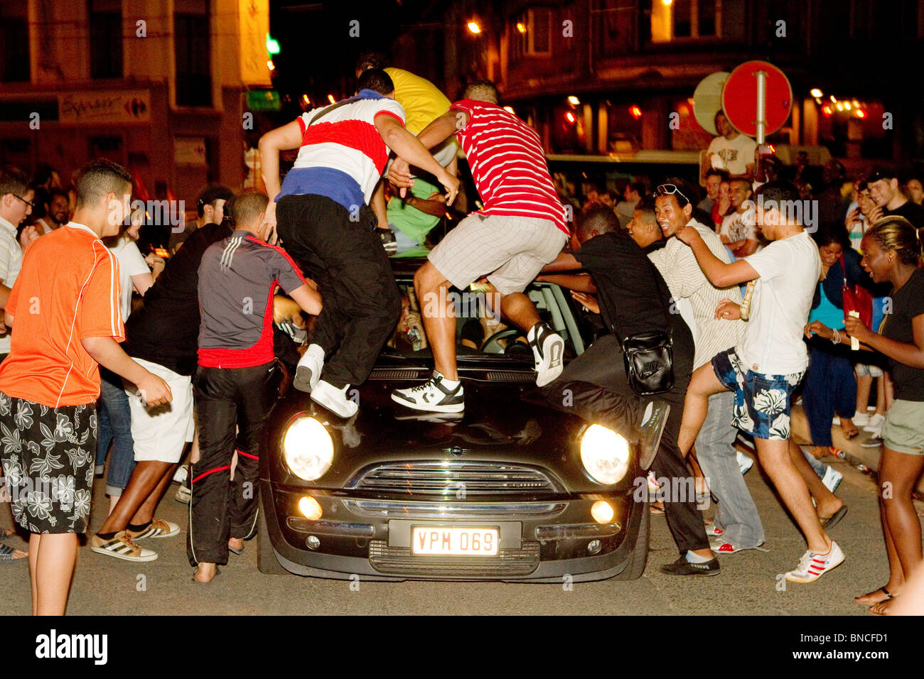 hooligans riots disturbance mob destroy destruction young men hooligans vandals thugs asbo youths jump damage damaging Stock Photo