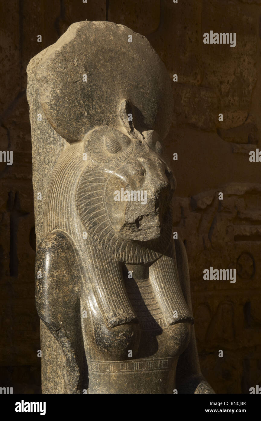 Goddess Sekhmet, goddess of war, represented with head of a lioness and the human body and crowned with the solar disk. Stock Photo