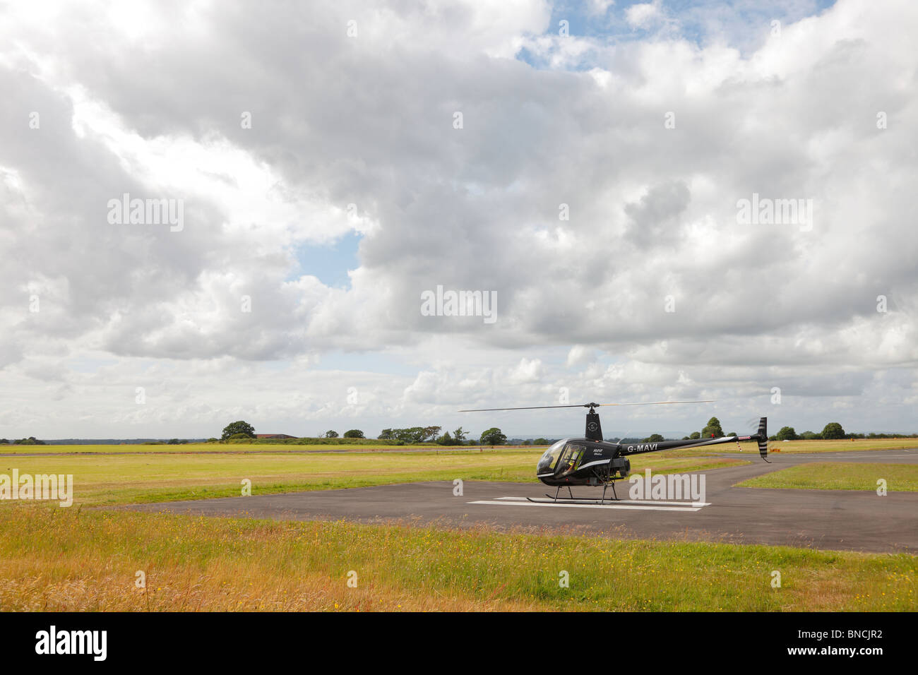 Helicopter taking off from Carlisle Airport, in Cumbria, England. Stock Photo