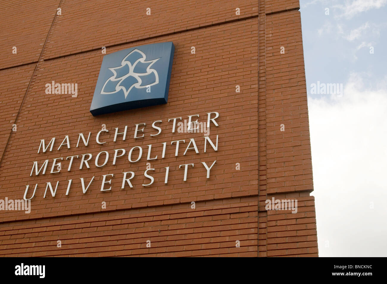 Manchester metropolitan university education degree degrees student students loan loans higher study studying learning inner cit Stock Photo