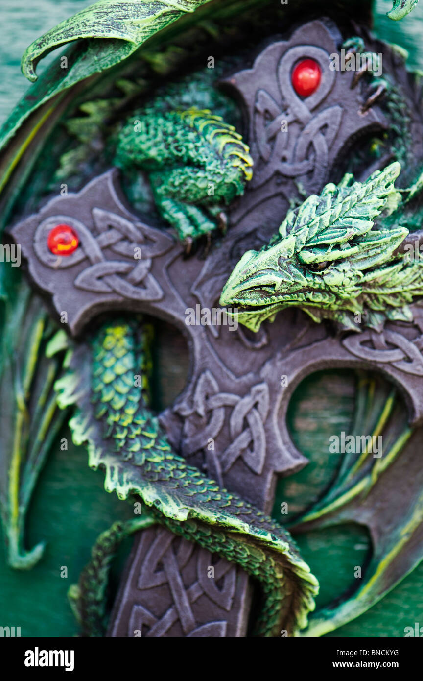 Dragon and the celtic cross plaque. Tewkesbury, Gloucestershire, England Stock Photo