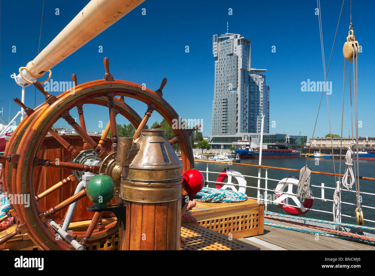 Sailing ship 'Dar Pomorza', view at the 'Sea Towers' high-rise - Gdynia, Pomerania, Poland Stock Photo