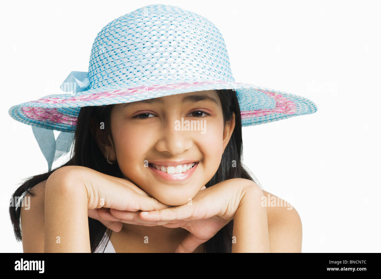 Portrait of a girl wearing a hat and smiling Stock Photo - Alamy