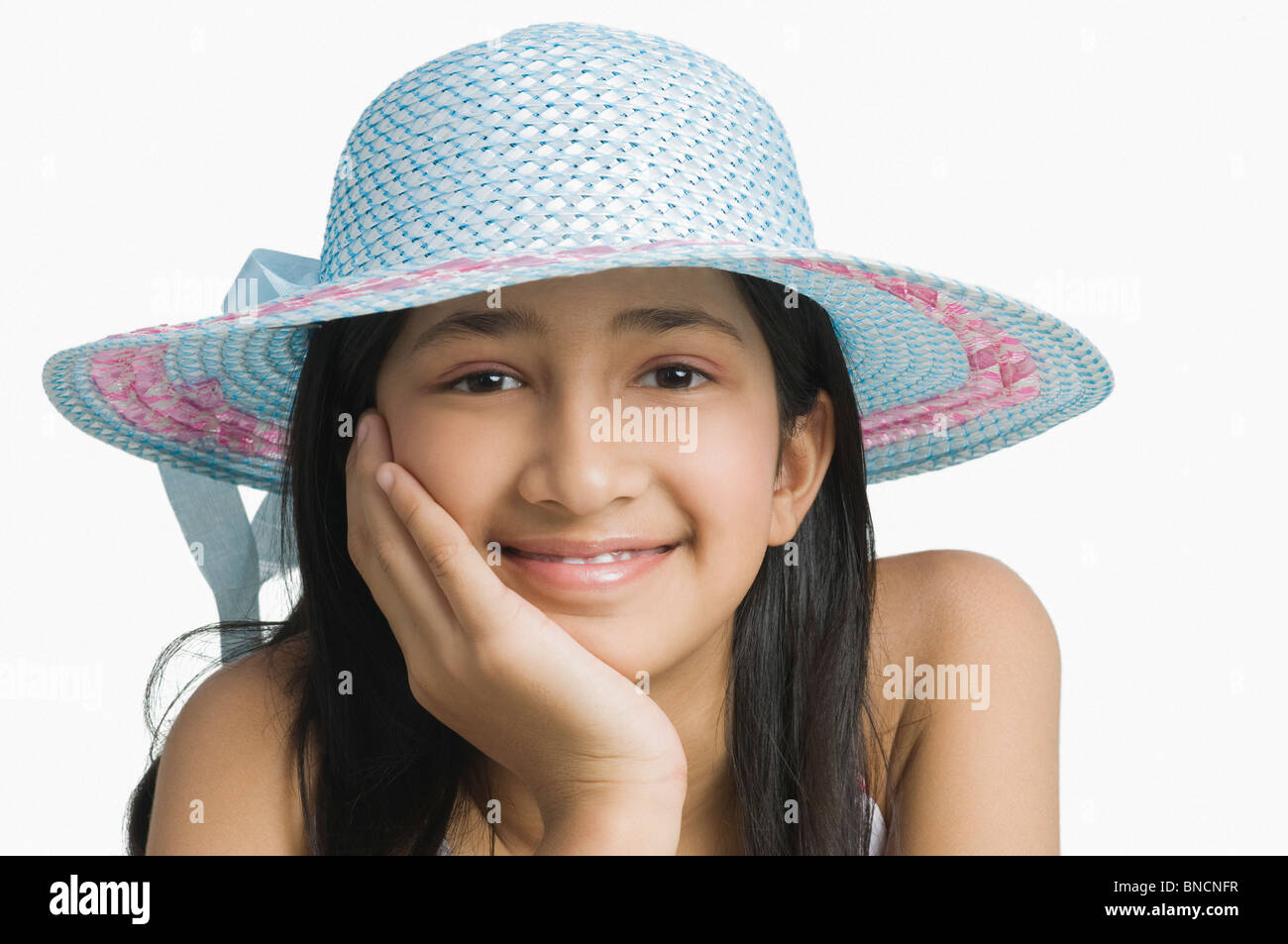 Portrait of a girl wearing a hat and smiling Stock Photo - Alamy