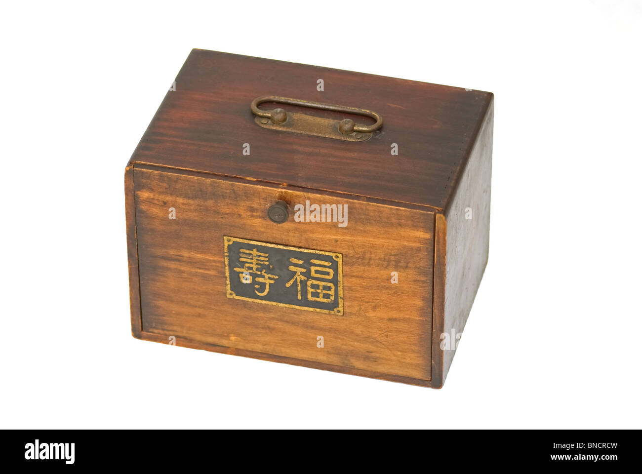 Mahjong antique game set in wood case with old metal sign with Chinese characters for long life and happiness. Stock Photo