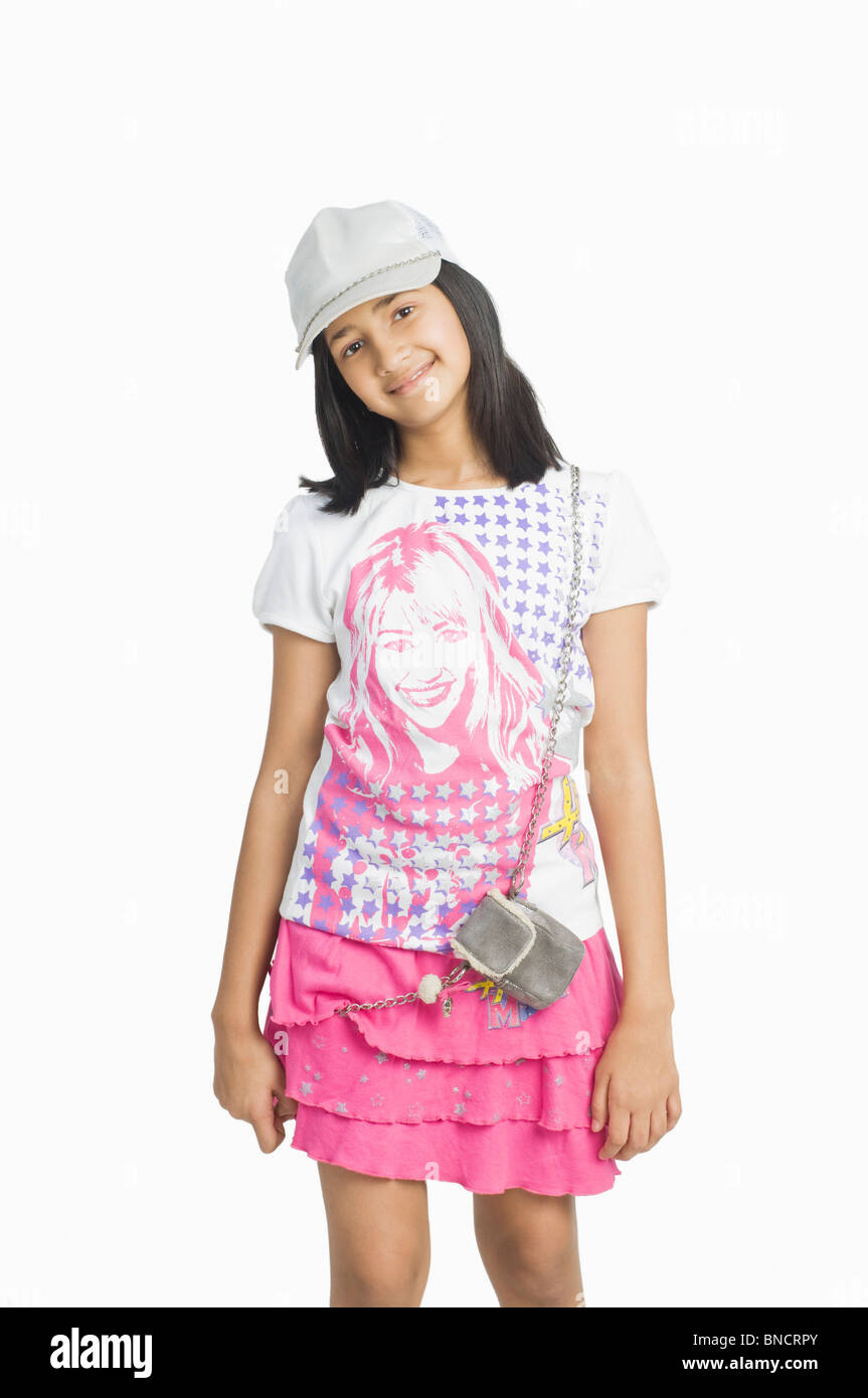 Portrait of a girl wearing a cap and smiling Stock Photo Alamy