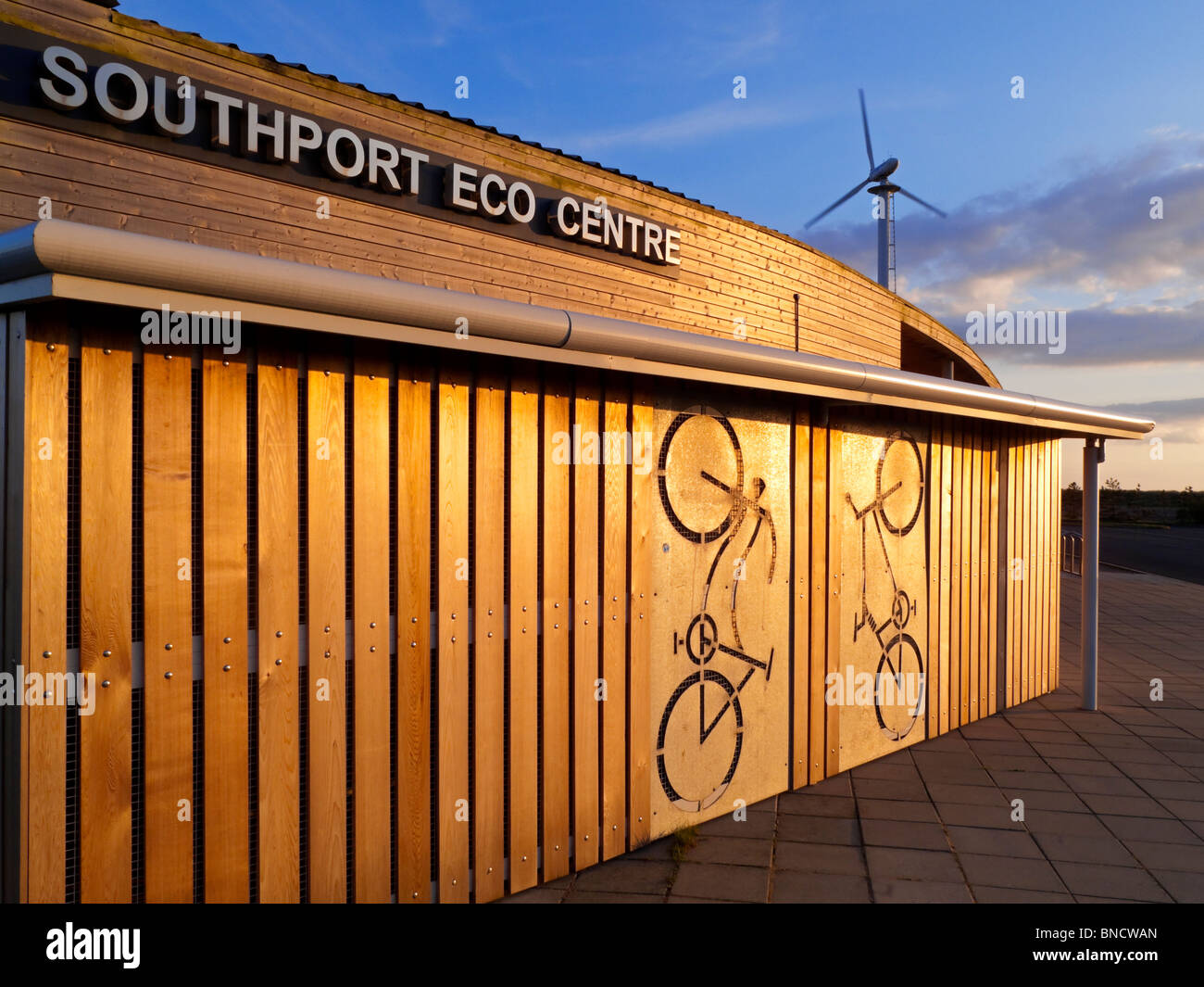 Southport Eco Centre and wind turbine on UK coast at Southport in Sefton Merseyside a visitor centre used to show sustainability Stock Photo