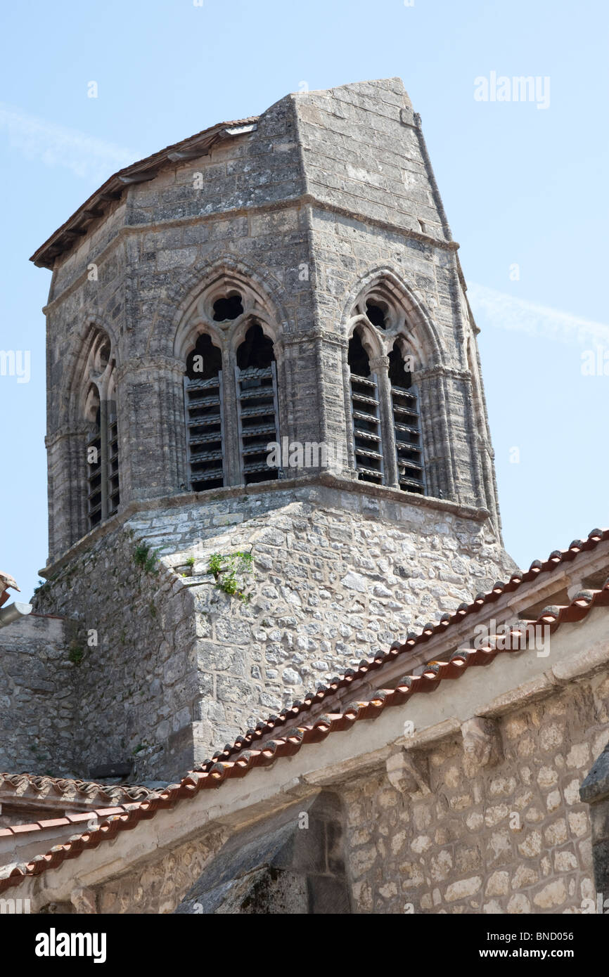 Church with a truncated steeple in a medieval village in the Auvergne, France. Stock Photo