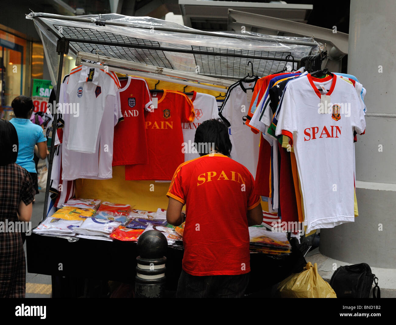 Market stall in Patpong night market, Bangkok selling Spain world cup shirts  Stock Photo - Alamy