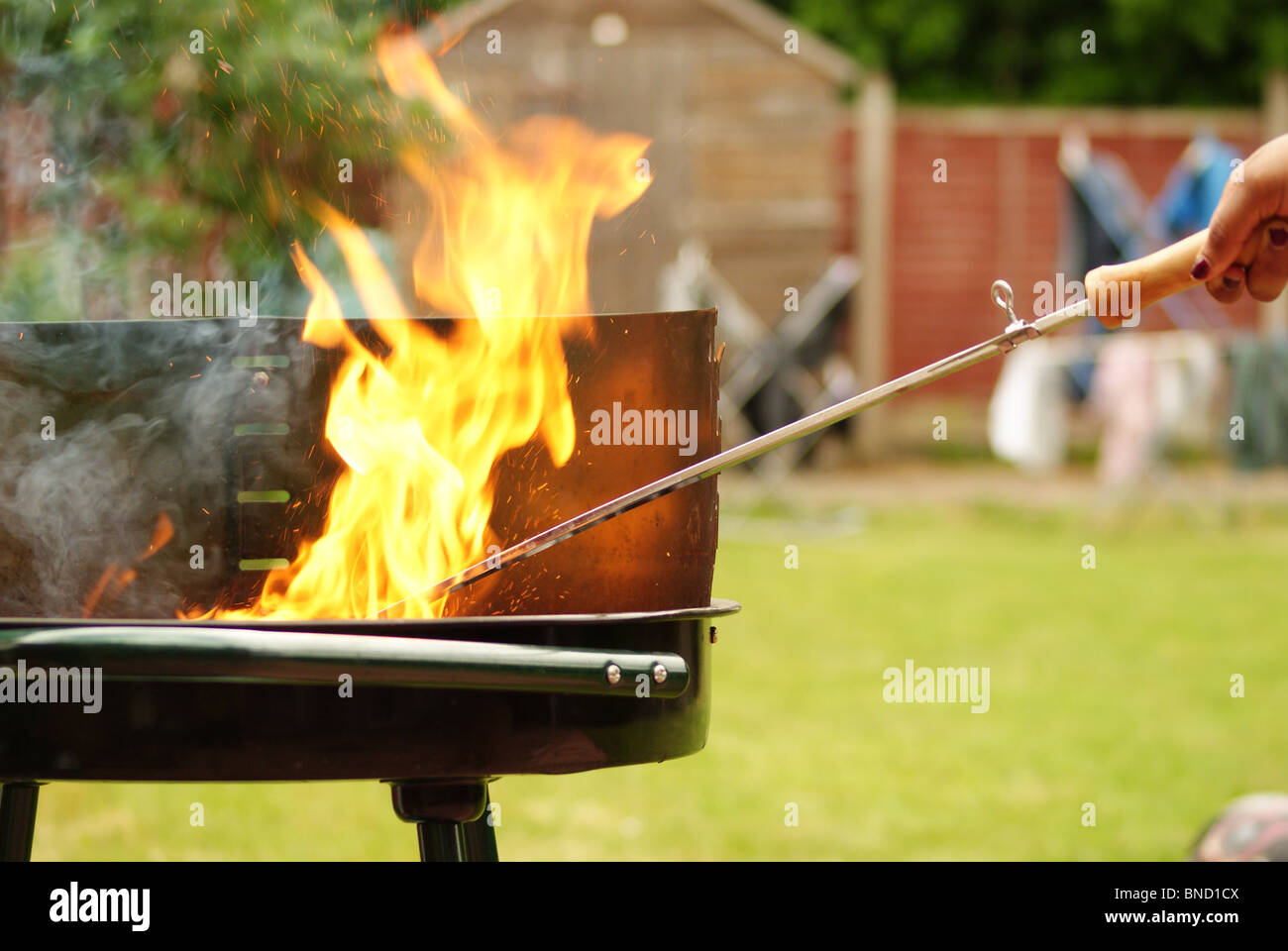 Bbq cook fire hi-res stock photography and images - Alamy