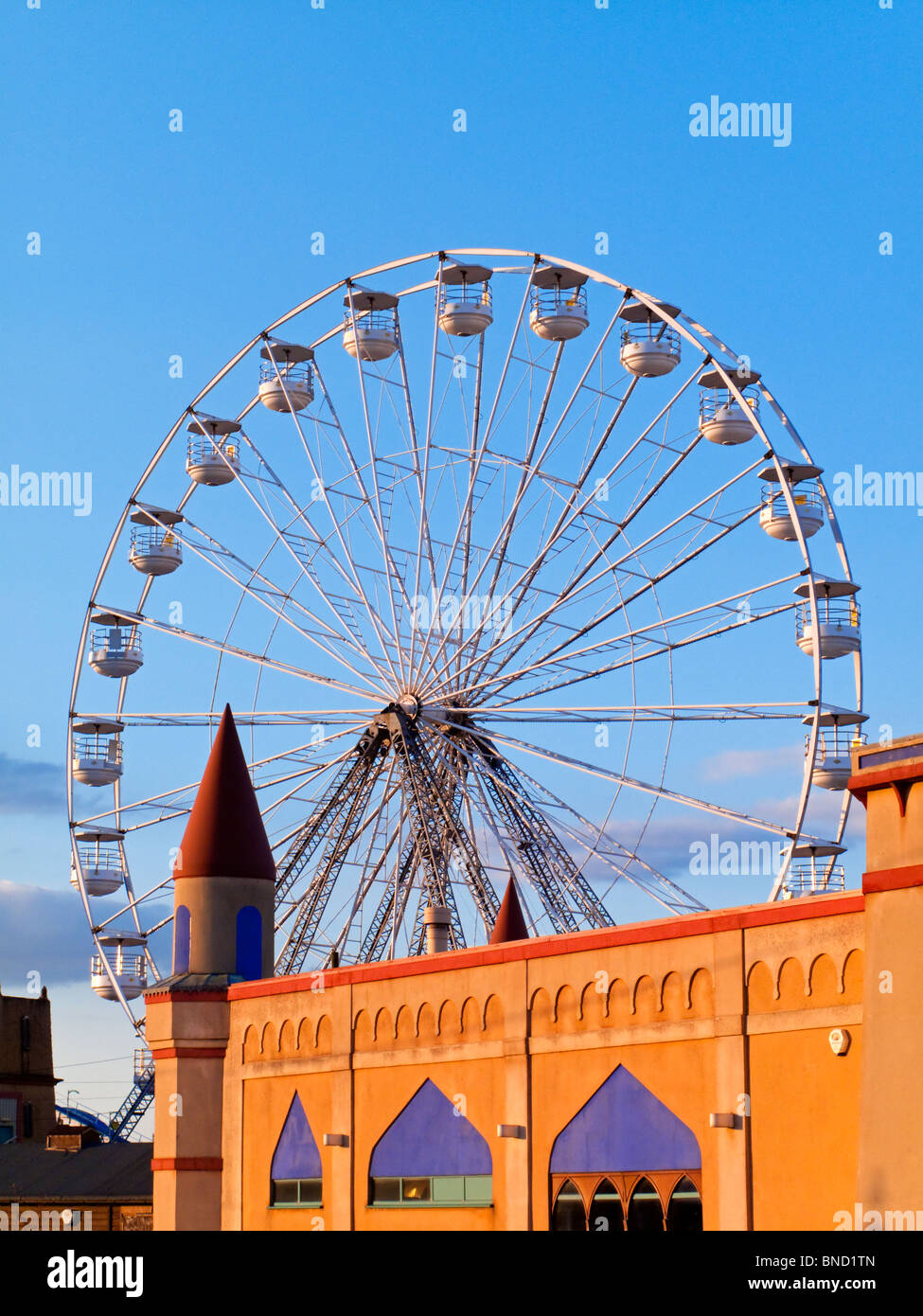 Big wheel and amusement park at Southport Merseyside England UK a resort on the north western coast of Britain Stock Photo
