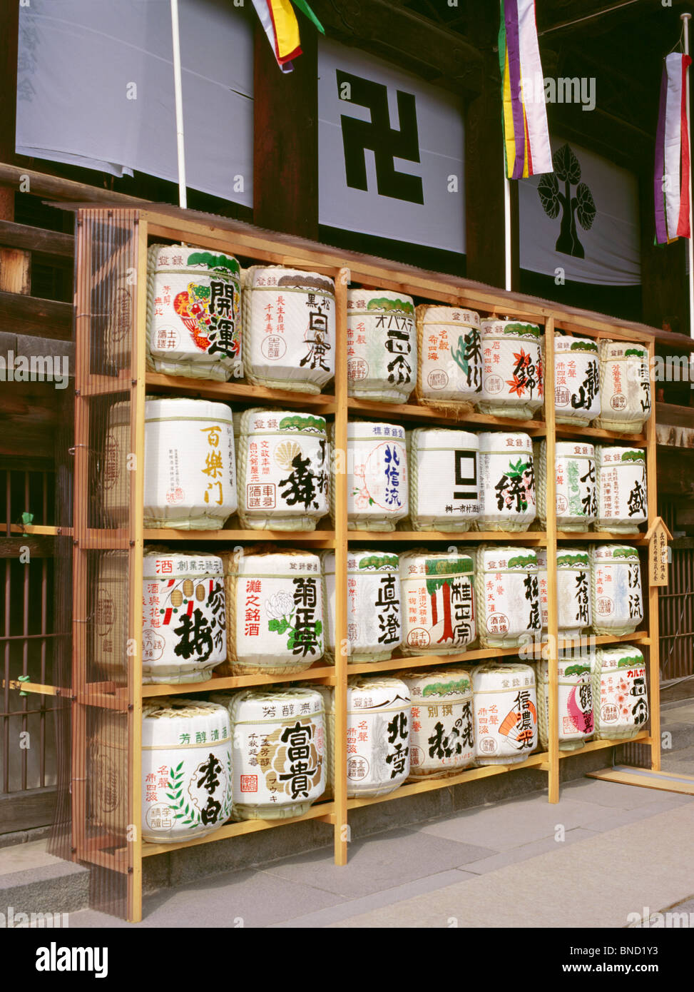 Sake barrels on display outside Zenkoji Temple, Nagano, Japan Stock Photo