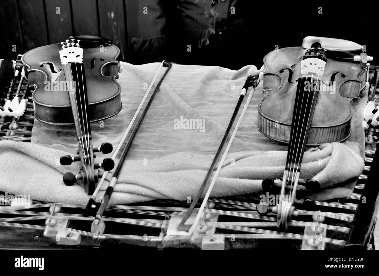 Gypsy violins resting on a table. Stock Photo