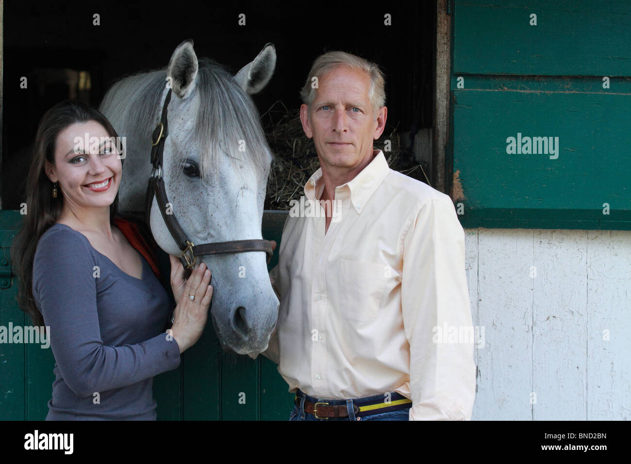 father and daughter with race horse Stock Photo Alamy