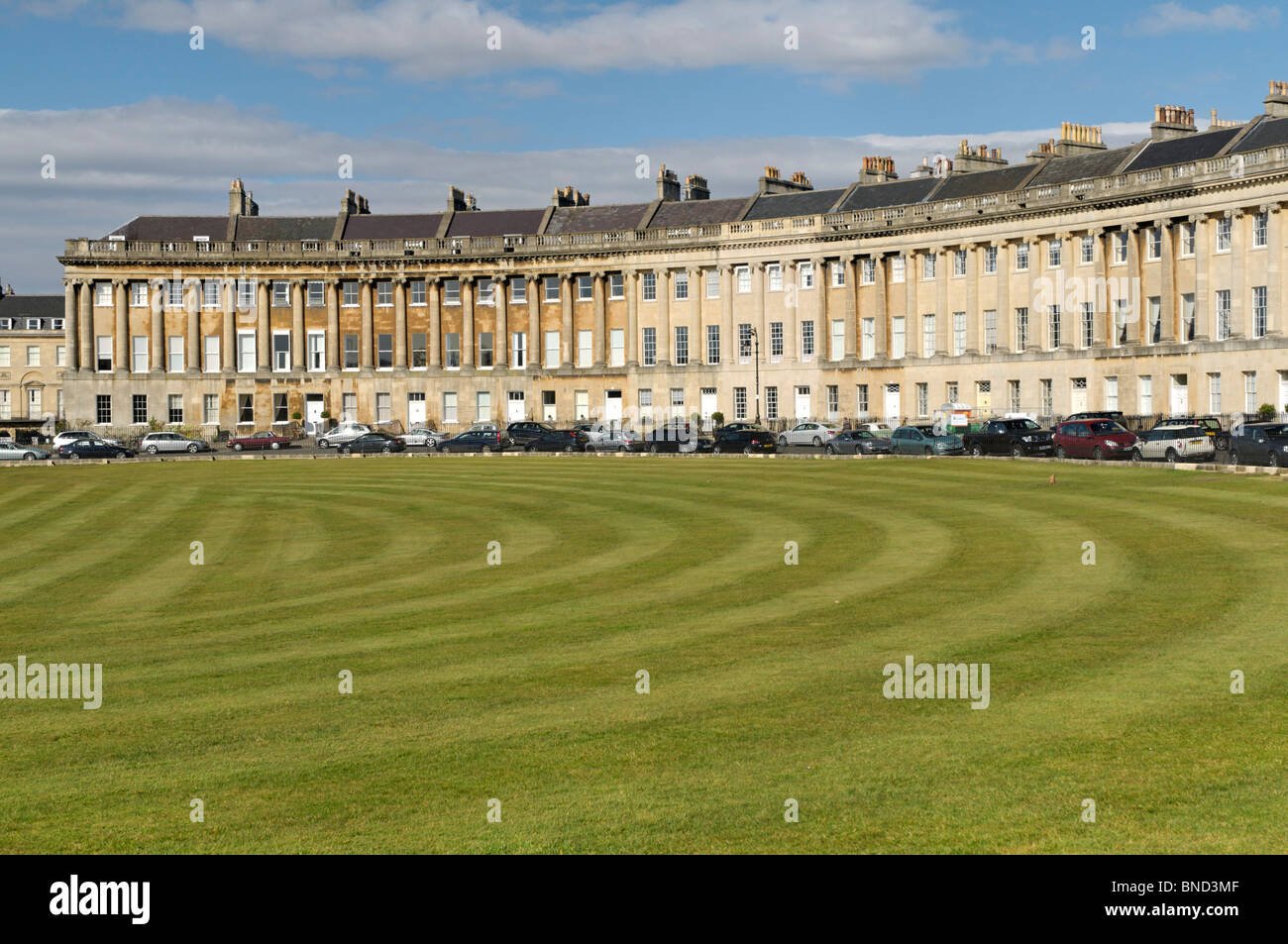 Lawns in front of  'Royal Crescent'  in the historic, planned Georgian city of Bath in the UK on a sunny day. Stock Photo