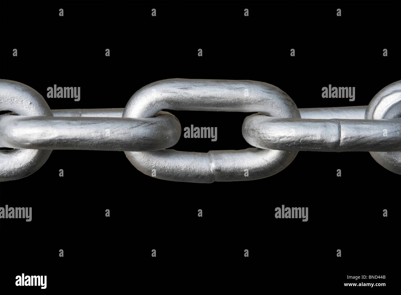 Steel chain links on the black background Stock Photo - Alamy