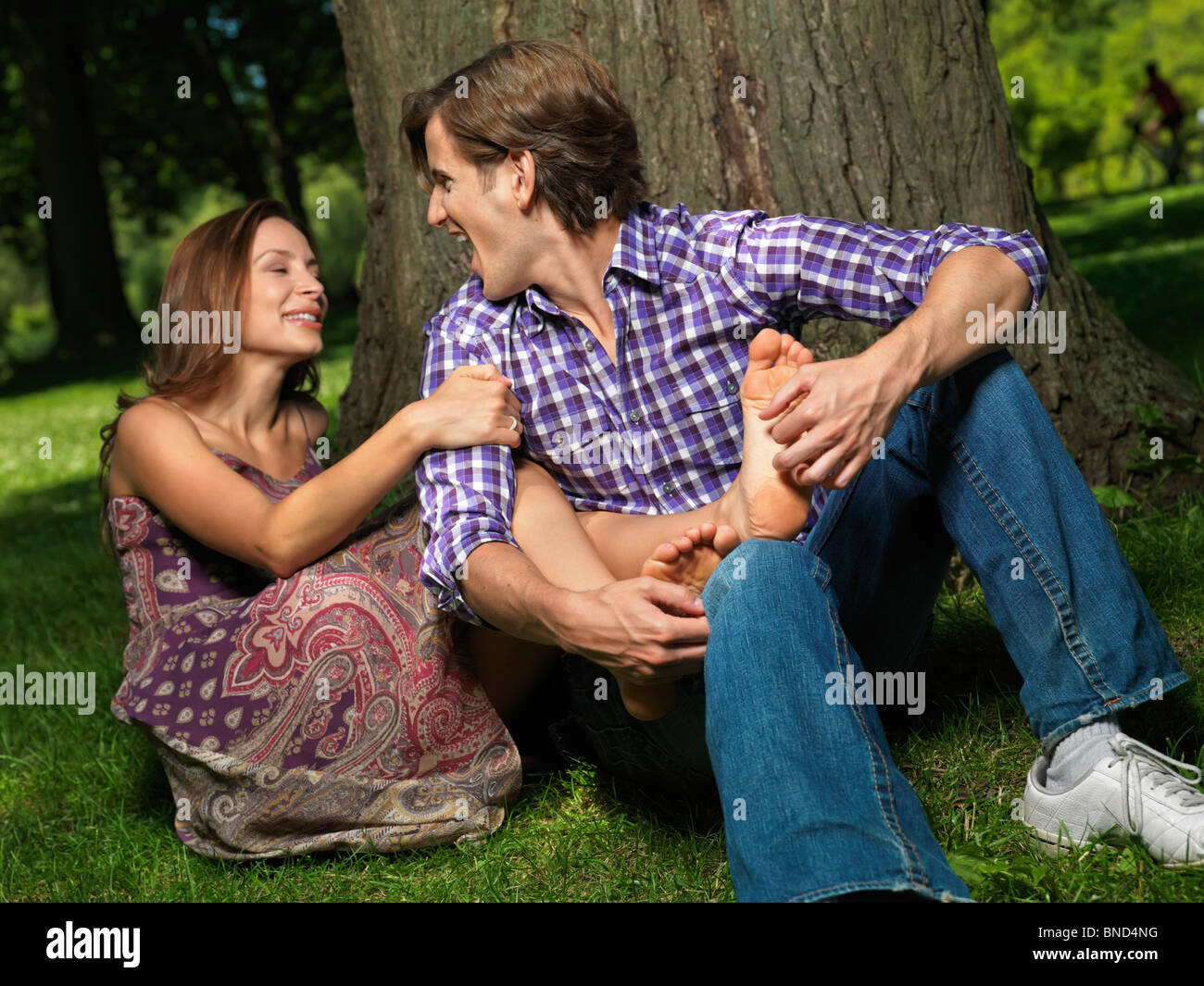 http://c8.alamy.com/comp/BND4NG/young-happy-couple-in-their-early-thirties-having-fun-in-the-nature-BND4NG.jpg