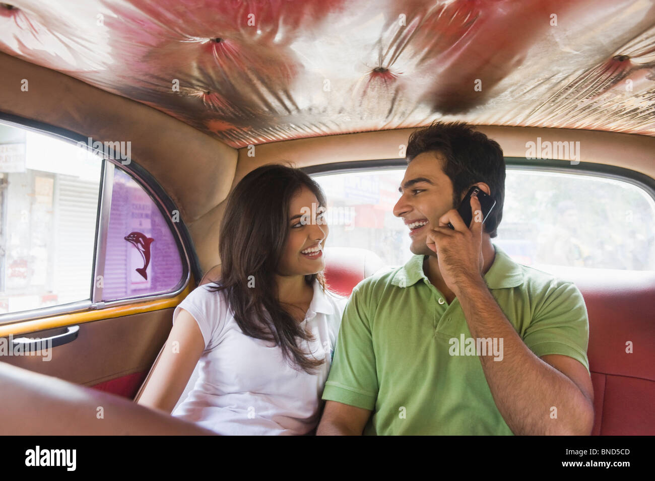 Couple in a car, Kolkata, West Bengal, India Stock Photo - Alamy