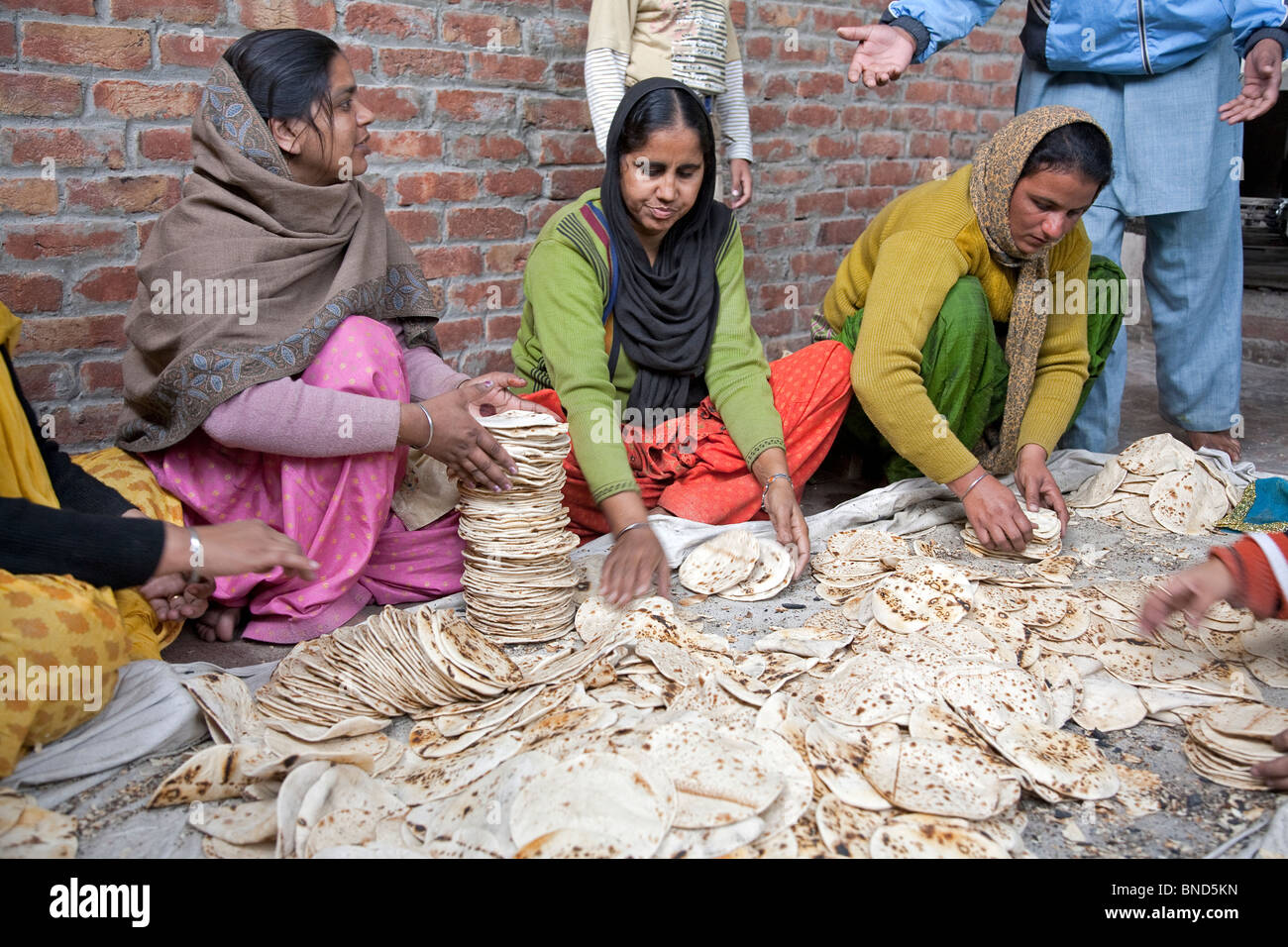 Chapatis for the pilgrims. The Golden Temple. Amritsar. Punjab. India Stock Photo