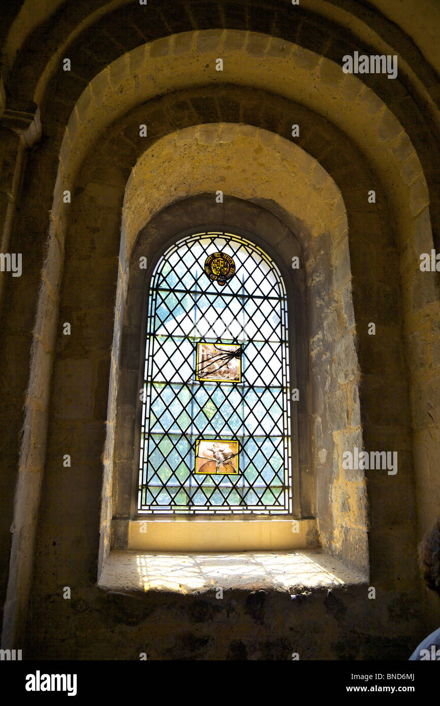 A window in St John's Chapel in the Tower of London, the 11th century church is the oldest in London Stock Photo