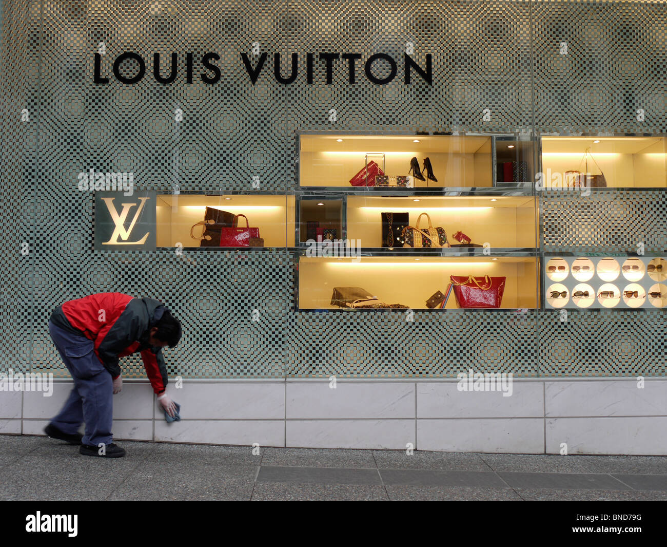Sneakers LV archlight Louis Vuitton collection 2020. Woman with Louis  Vuitton sneakers walking in the street of Brussels Stock Photo - Alamy