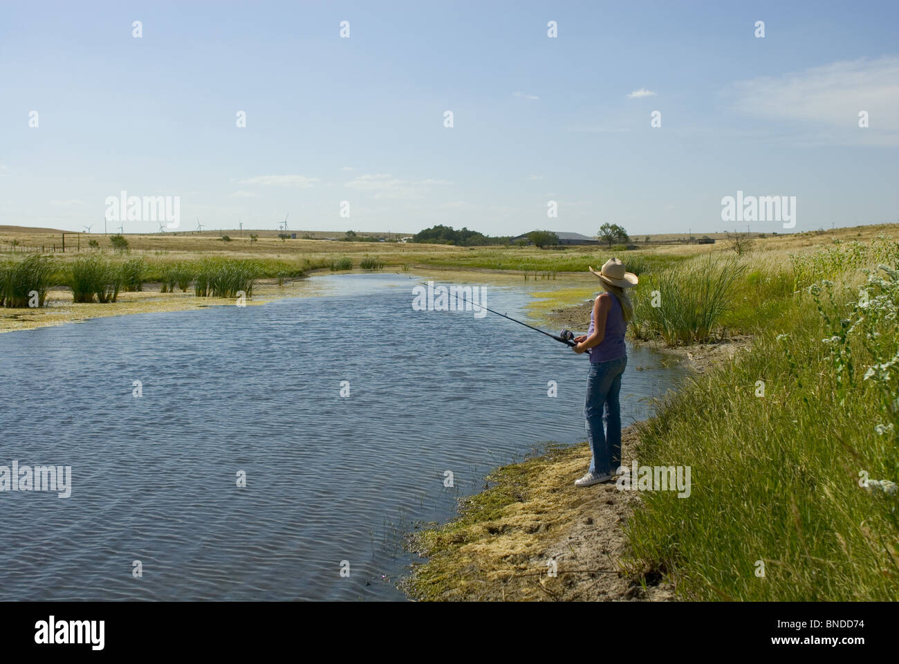 Young cowboy fishing hi-res stock photography and images - Alamy