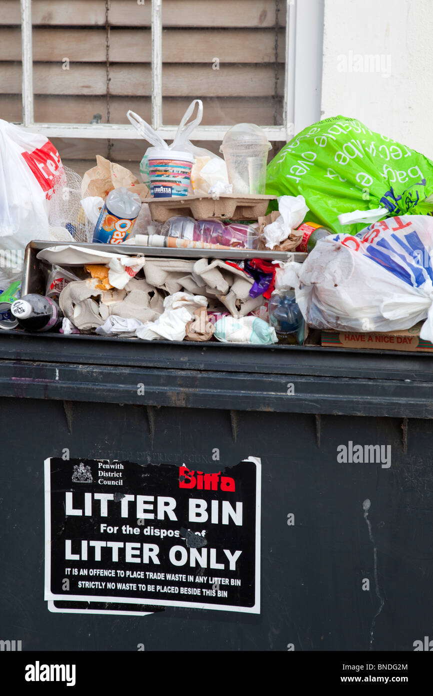 Litter bin overflowing; St Ives; Cornwall Stock Photo