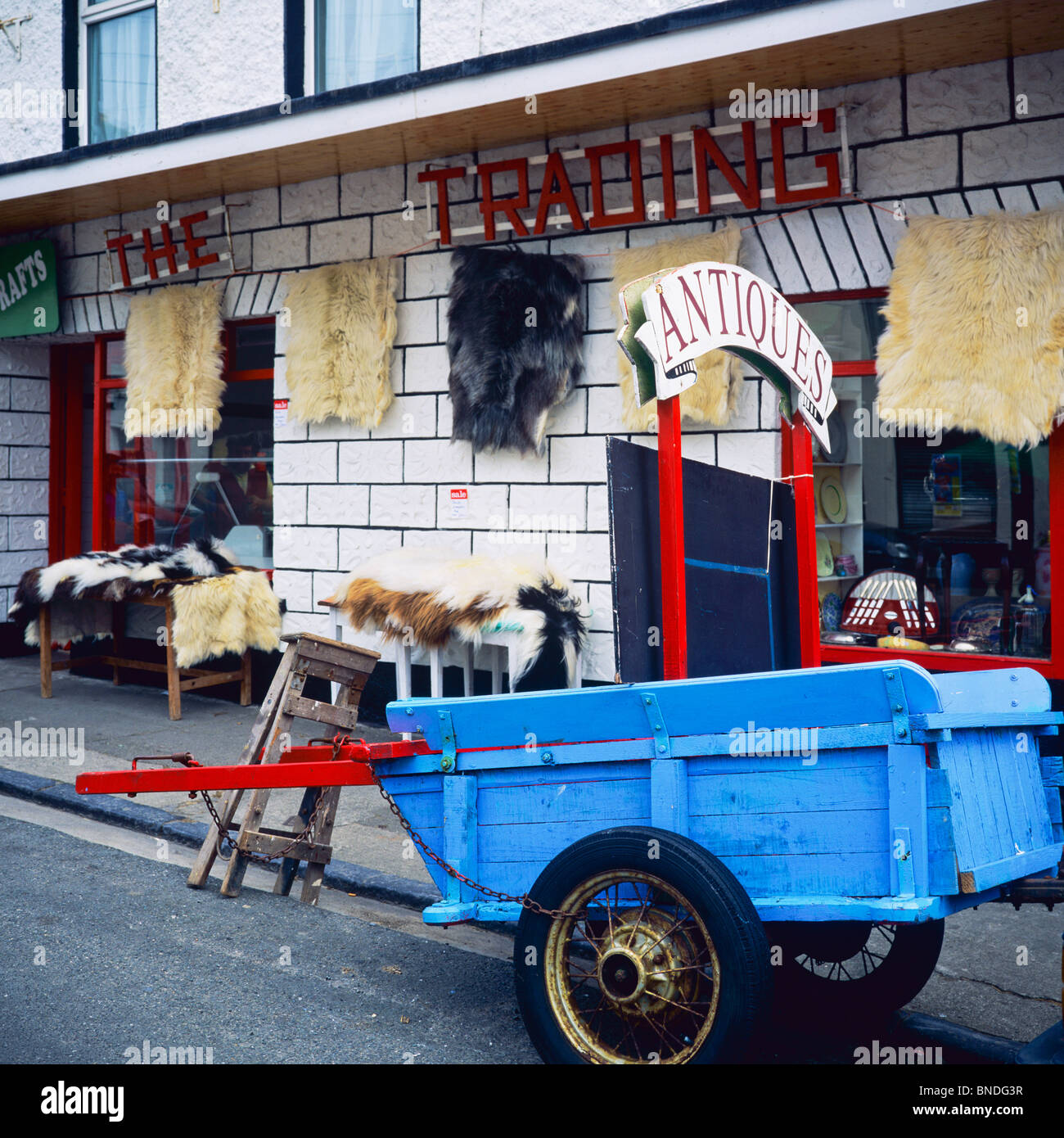 Blue trailer and 'The Trading' antiques shop, Louisburgh, County Mayo, Republic of Ireland Stock Photo