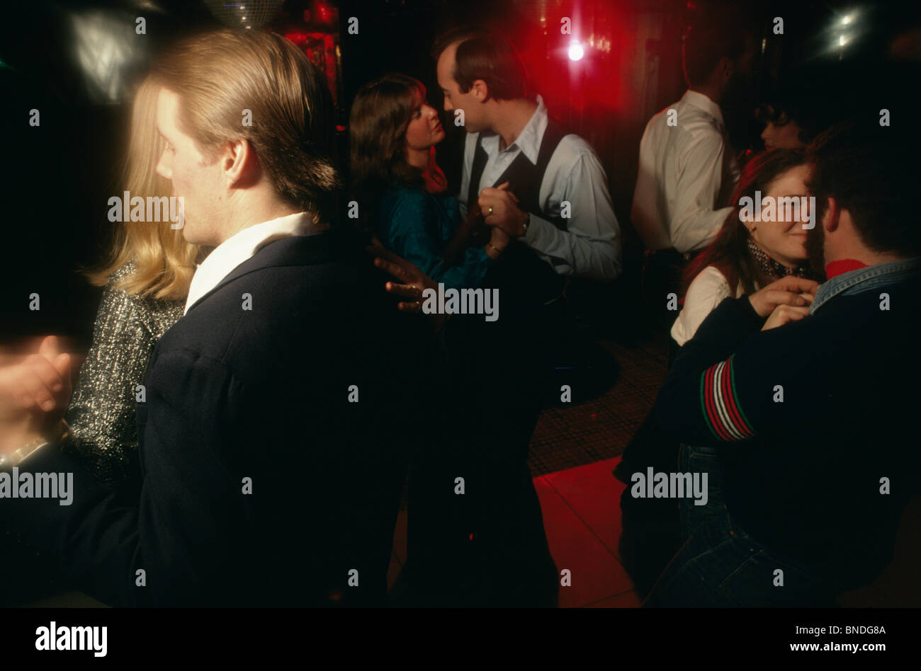 Group of people dancing in a nightclub Stock Photo