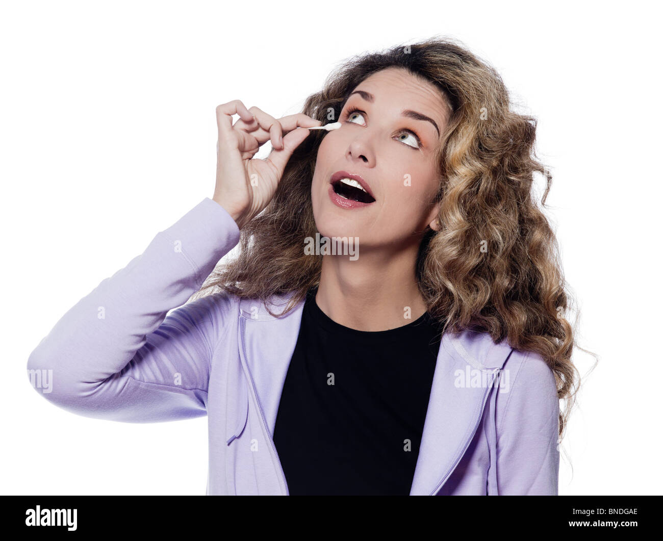 caucasian woman makeup remove portrait isolated studio on white background Stock Photo