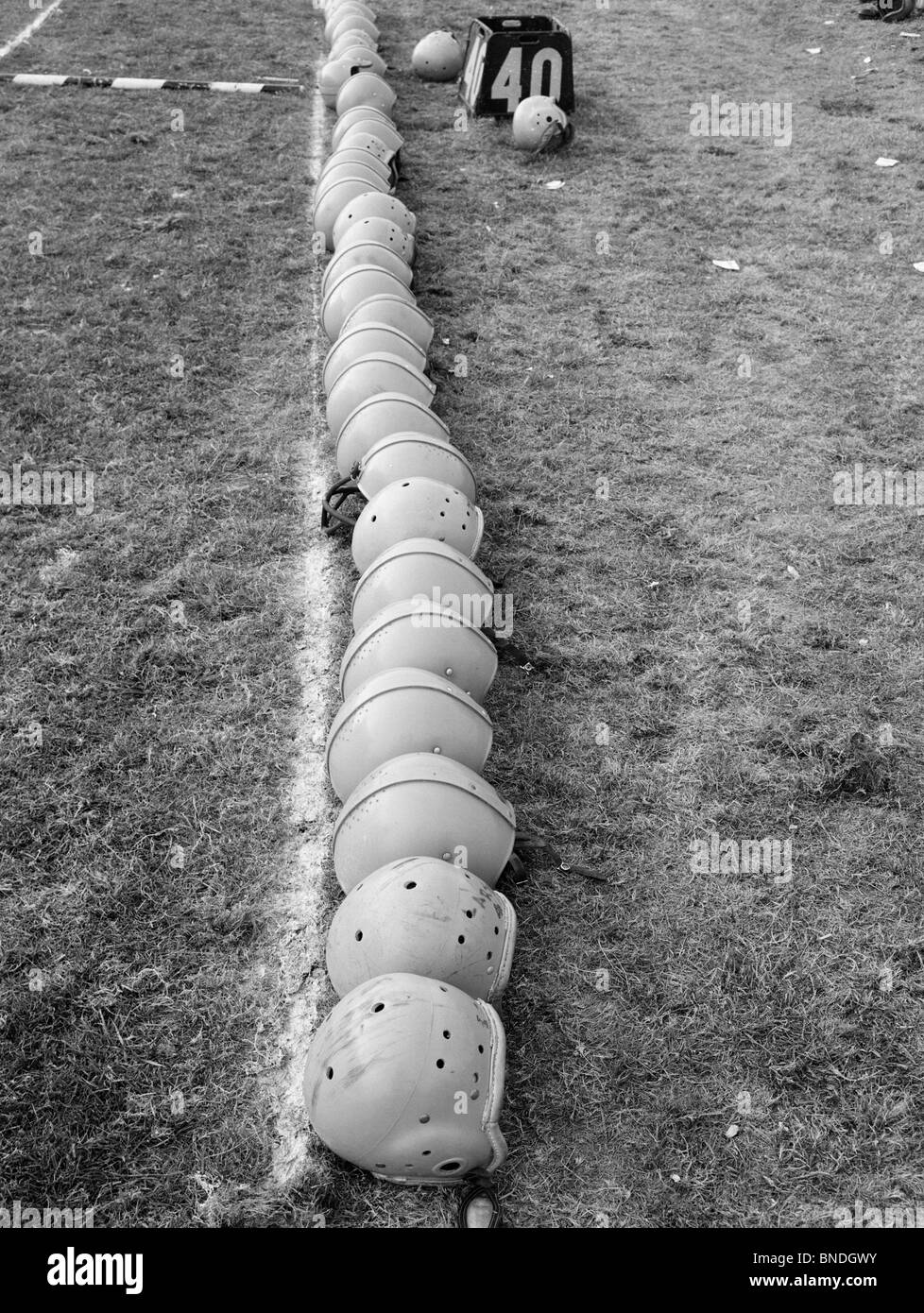 High angle view of football helmets in a row Stock Photo