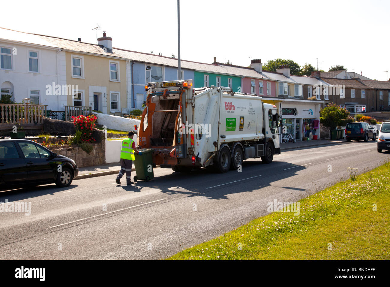 refuge collection in Hayle, Cornwall, England. Dustman collecting
