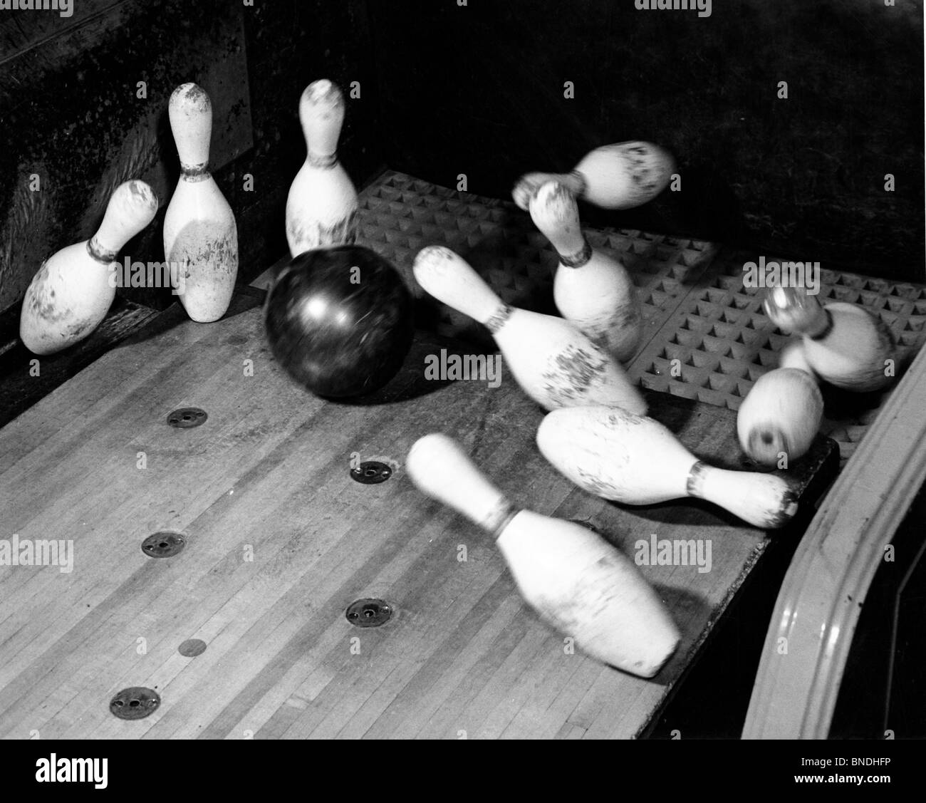 Bowling ball rolling down Black and White Stock Photos & Images Alamy