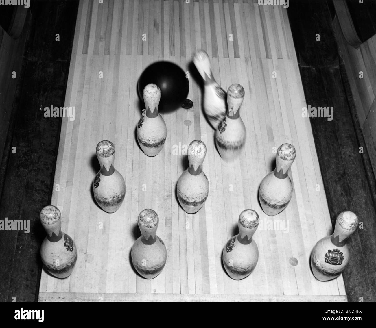 High angle view of a bowling ball knocking down bowling pins Stock Photo Alamy