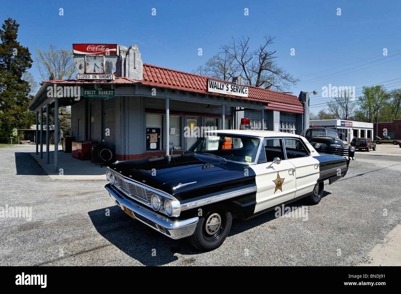 Old Police Car in Front of Wally's Service Station in Mount Airy, North Carolina Stock Photo