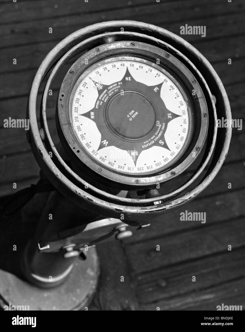 Close up of compass on deck of boat, Compass-Gyro Repeater Stock Photo