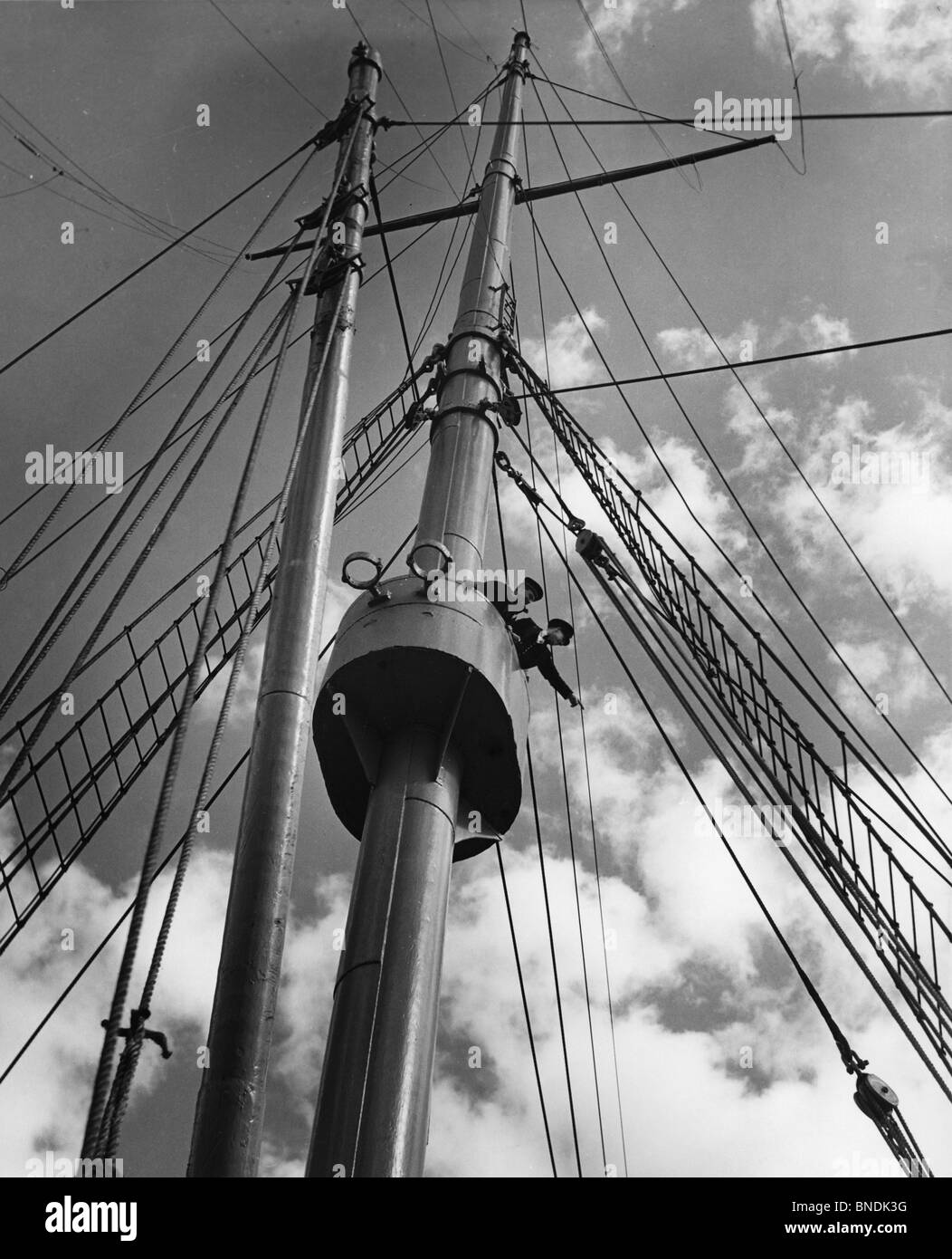 Low angle view of two masts of a military ship Stock Photo