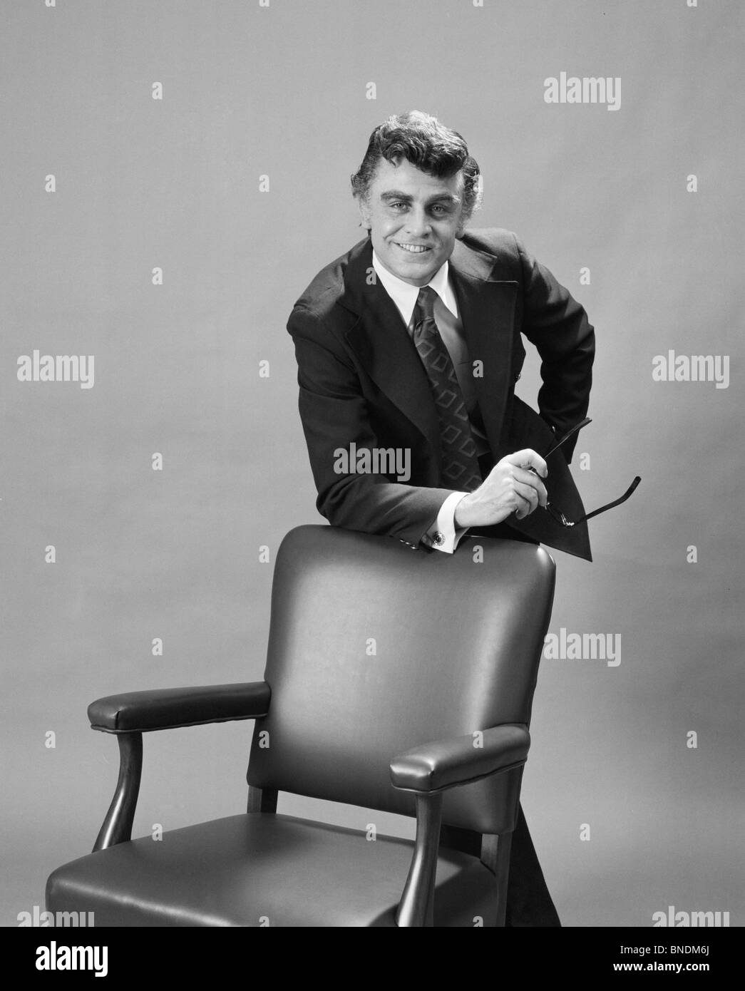 Portrait of a businessman smiling Stock Photo - Alamy