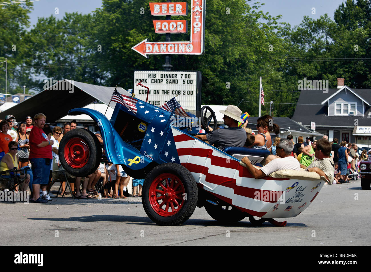 Patriotic Wheelie Car in Oldest Continuous Independence Day Parade in America in New Pekin 