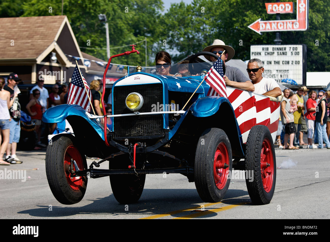 Patriotic Wheelie Car in Oldest Continuous Independence Day Parade in America in New Pekin 