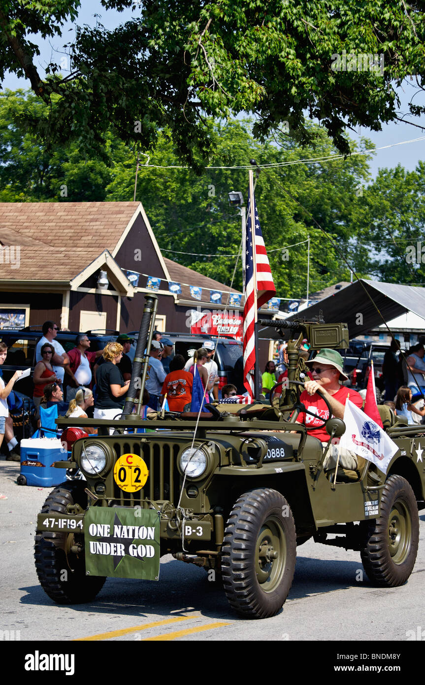 Man Driving Old Army Jeep in Oldest Continuous Independence Day Parade in America in New Pekin, Indiana Stock Photo